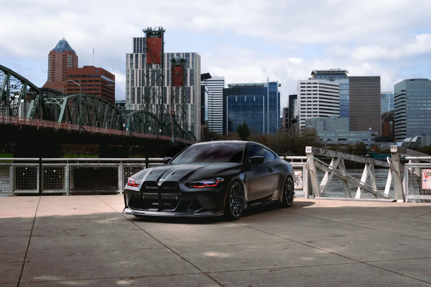 Collector BMW M4 detailed by Platinum Auto Care with the Portland skyline behind