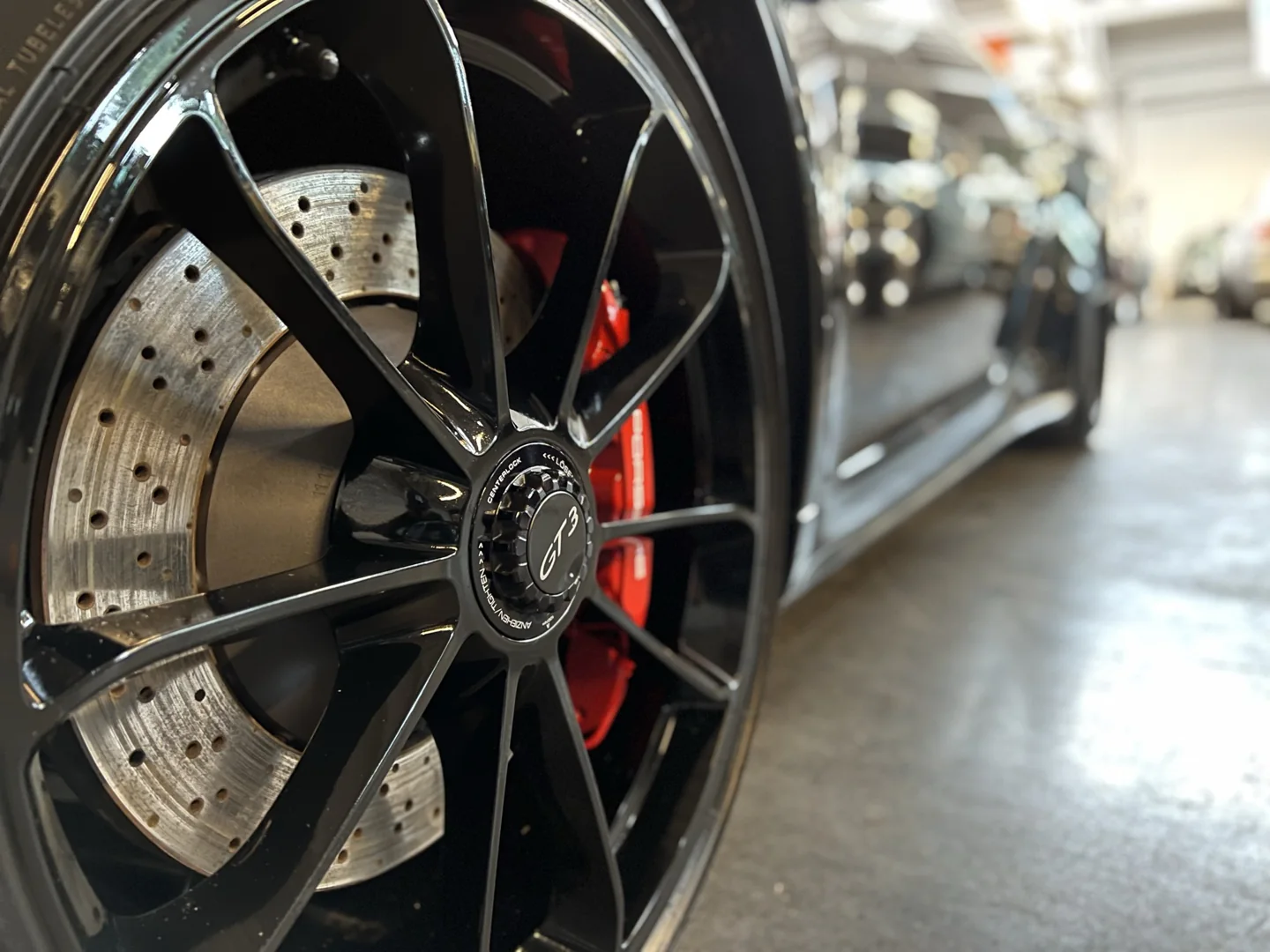 Porsche GT3 RS wheel detail — dormancy care for a stored collection car